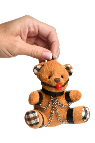 Llavero de oso de peluche amordazado