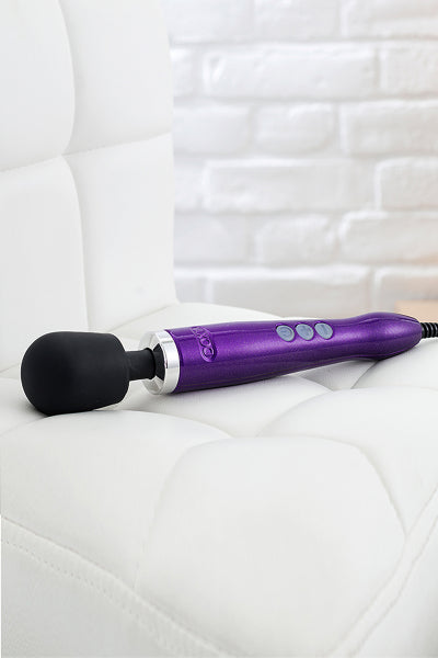 Vibrador Doxy de metal fundido violeta